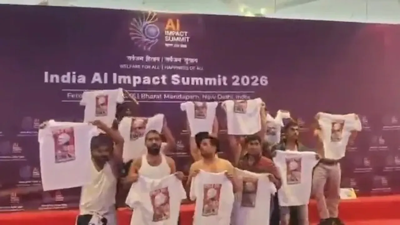  protest by youth congress worker: ଏଆଇ ସମ୍ମିଳନୀରେ ଯୁବ କଂଗ୍ରେସ କର୍ମୀଙ୍କ ସାର୍ଟ ଖୋଲି ବିରୋଧ ପ୍ରଦର୍ଶନ