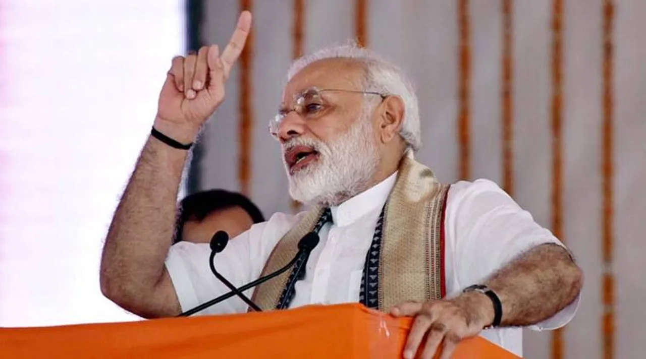  Varanasi: Prime Minister Narendra Modi addresses during a function for the launch of various developmental projects, in Varanasi, Uttar Pradesh on Friday. PTI Photo / PIB (PTI9_22_2017_000182A) 
