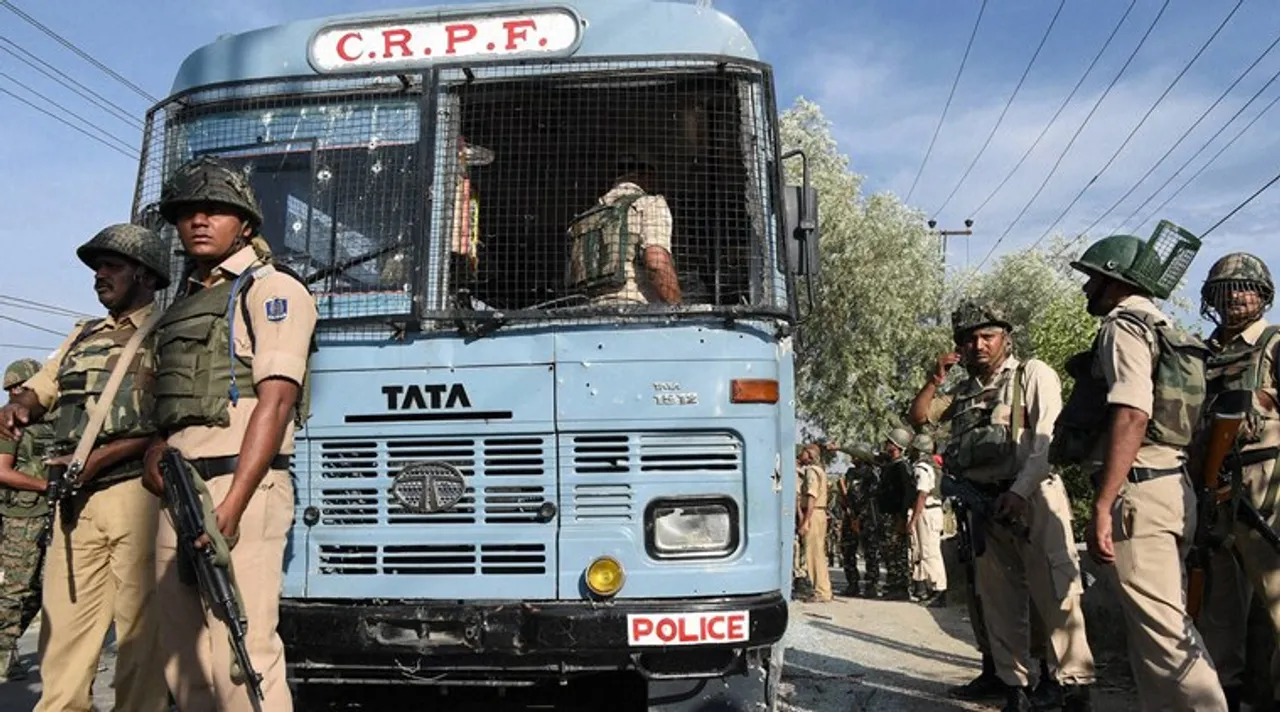  Srinagar: Security forces inspecting the CRPF bus which was attacked by militants on Srinagar-Jammu National High Way at Pampore on the out skirts of Srinagar on Saturday. Eight CRPF  personnel and two militants were killed in the shoot out. PTI Photo by S Irfan(PTI6_25_2016_000181A) 