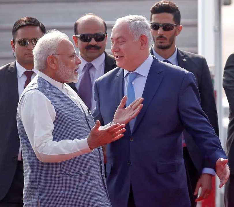  Israeli Prime Minister Benjamin Netanyahu is welcomed by his Indian counterpart Narendra Modi upon his arrival at Air Force Station Palam in New Delhi, India, January 14, 2018. REUTERS/Adnan Abidi - RC12BD1BCDE0 