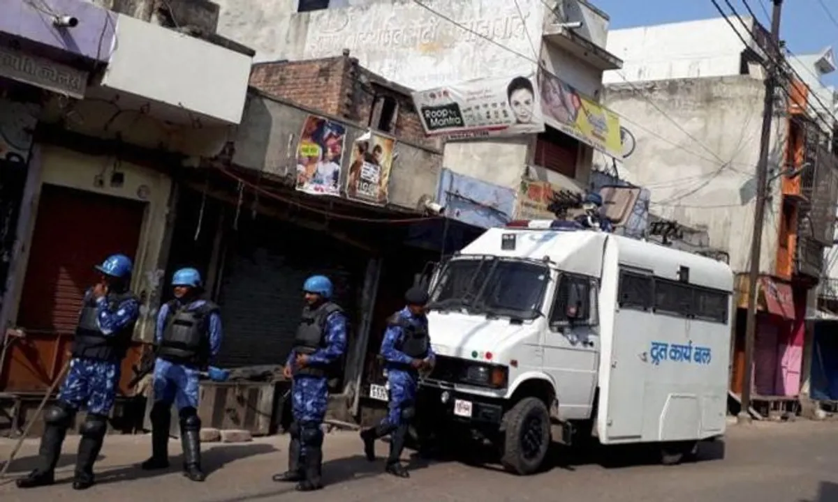 Kasganj (UP): More than 80 persons were arrested while Rapid Action Force (RAF) and Provincial Armed Constabulary (PAC) personnel intensified vigil in Kasganj on Sunday. PTI Photo  (PTI1_28_2018_000206B) 