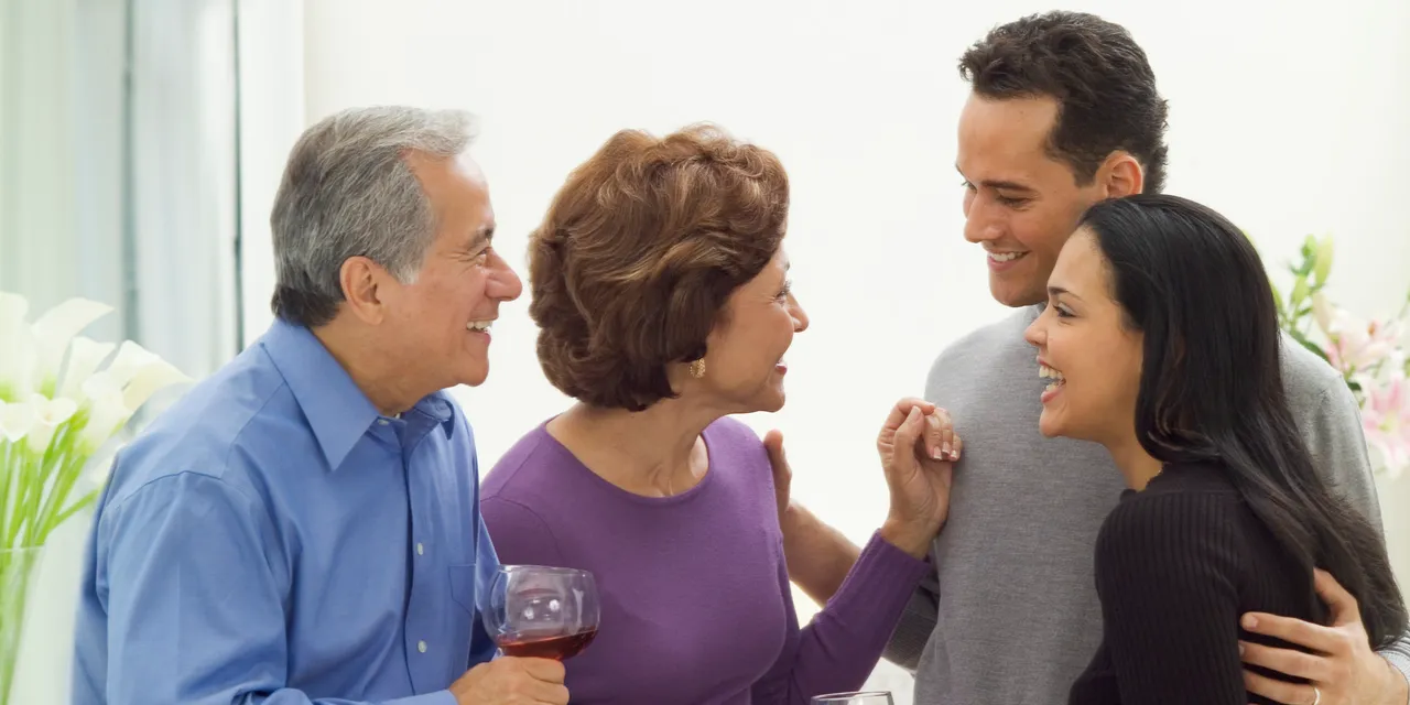  Parents Chatting with Child and Spouse 