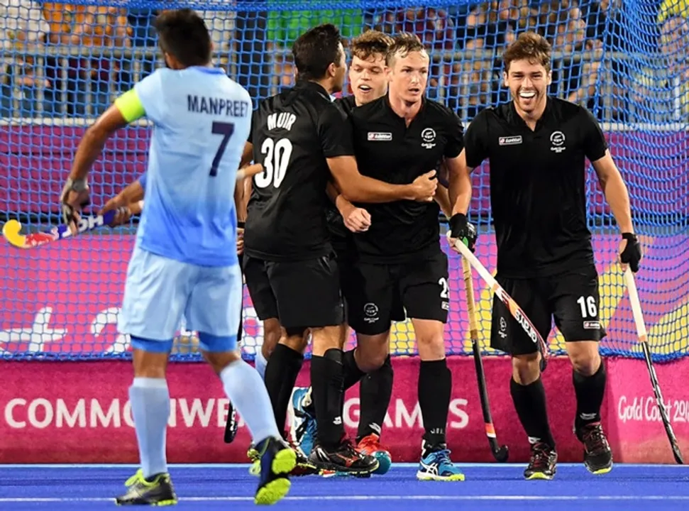  GOLD COAST, AUSTRALIA - APRIL 13: Hugo Inglis of New Zealand is congratulated by team mates after scoring a goal in the semi final match between New Zealand and India during Hockey on day nine of the Gold Coast 2018 Commonwealth Games at Gold Coast Hockey Centre on April 13, 2018 on the Gold Coast, Australia.  (Photo by Bradley Kanaris/Getty Images) 