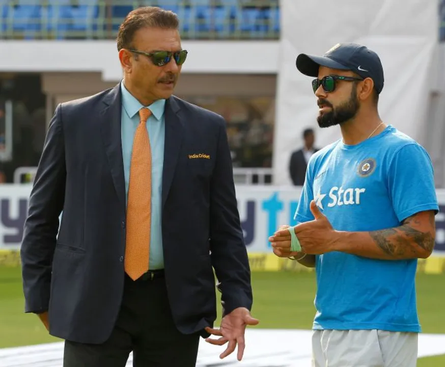  Virat Kohli Captain of India with Former Indian cricketer Ravi Shastri during day one of the 2nd test match between India and England in Vizag held at the Dr. Y.S. Rajasekhara Reddy ACA-VDCA Cricket Stadium on the 17th November 2016.

Photo by: Deepak Malik/ BCCI/ SPORTZPICS 