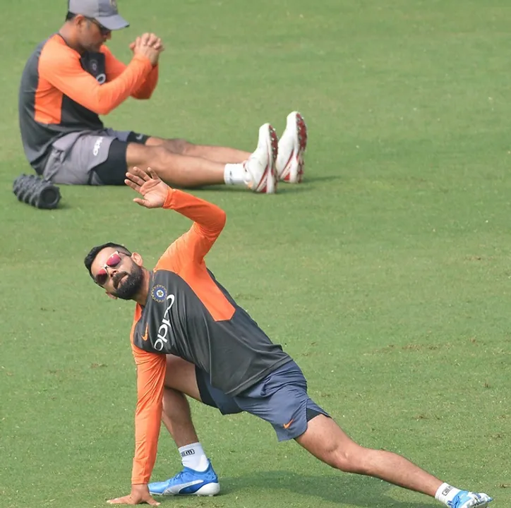  Guwahati: Team India captain Virat Kohli and MS Dhoni during a practice session ahead of the first One Day International cricket match against West Indies, at ACA Cricket Stadium, Barsapara in Guwahati, Saturday, October 20, 2018. (PTI Photo)  (PTI10_20_2018_000037B) 