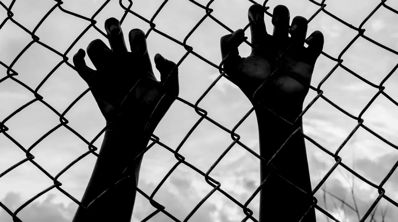  silhouette of the boy holding the cage , imprisoned, retarded, Child Abuse in white tone 