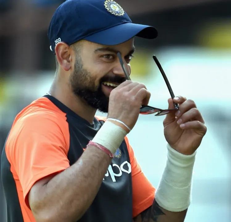  Rajkot: Indian cricket team captain Virat Kohli  during a practice session ahead of their first test match against West Indies, in Rajkot, Wednesday, Oct 3, 2018.  (PTI Photo/Shashank Parade)(PTI10_3_2018_000042B) 