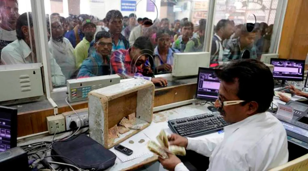  An Indian Railways staff counts currency notes of 500 denomination at a ticket counter, one of the few places still accepting the high denomination notes, in Allahabad, India , Wednesday, Nov. 9, 2016. Indians awakened to confusion Wednesday as banks and ATMs remained closed after the government withdrew the highest-denomination currency notes overnight to halt money laundering in a country where many in the poor and middle-class still rely mainly on cash. (AP Photo/Rajesh Kumar Singh) 