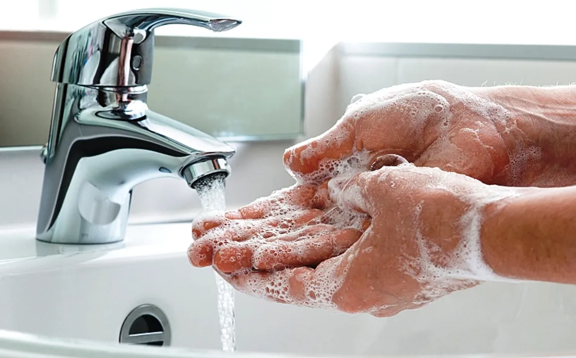  Washing of hands with soap under running water 