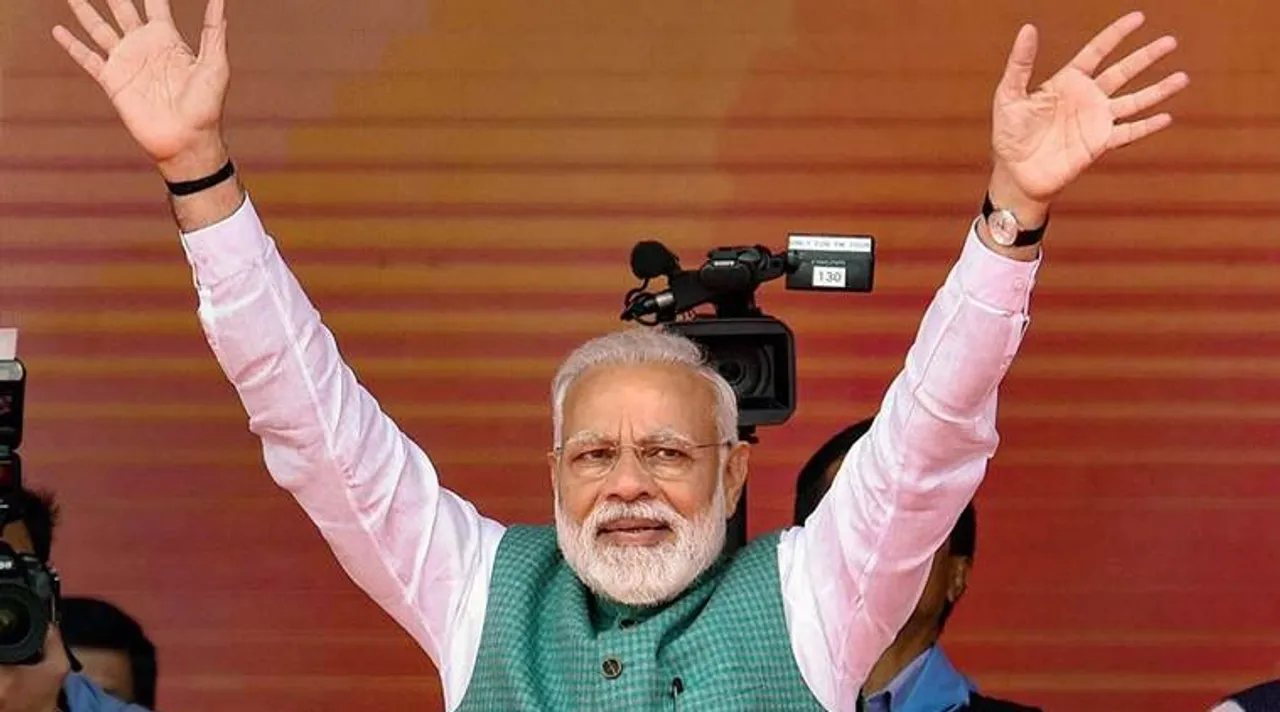  Patna: Prime Minister Narendra Modi waves at his supporters during Sankalp Rally at Gandhi Maidan in Patna, Sunday, March 3, 2019. (PTI Photo) (PTI3_3_2019_000026B) 