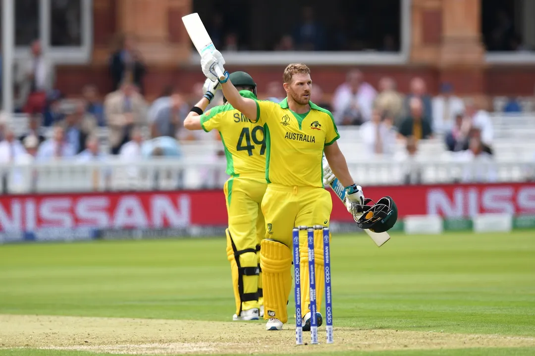  LONDON, ENGLAND - JUNE 25: Aaron Finch of Australia celebrates reaching his century during the Group Stage match of the ICC Cricket World Cup 2019 between England and Australia at Lords on June 25, 2019 in London, England. (Photo by Mike Hewitt/Getty Images) 