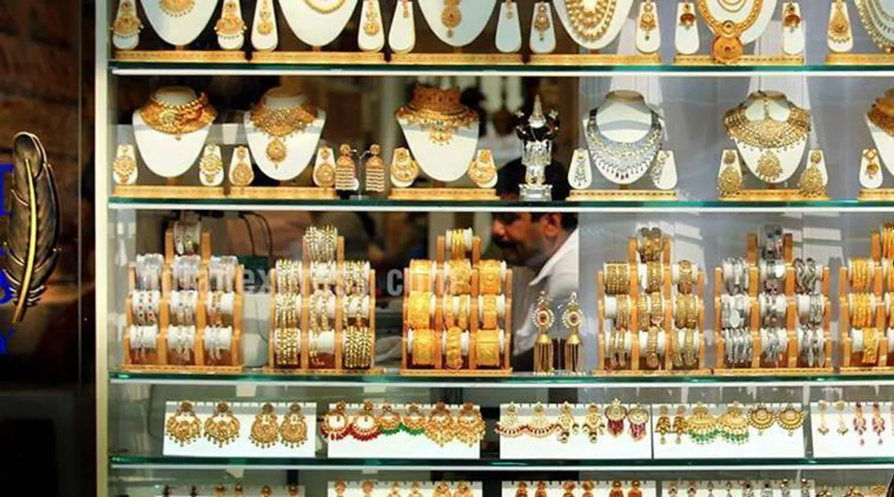  A jewelery shop dislpays a range of ornaments on the day of Dhanteras at Zaveri Bazaar on Tuesday. Express photo by Janak Rathod. 17 October 2017, Mumbai. 