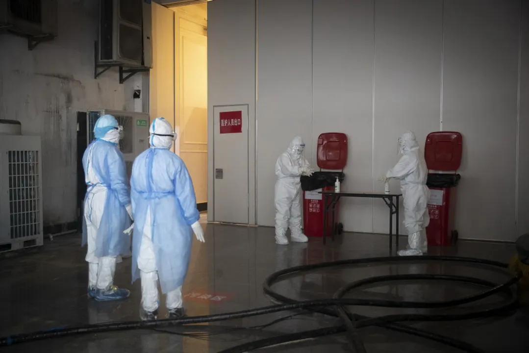  WUHAN, CHINA - FEBRUARY 12, 2020 - Doctors at the fangcang hospital disinfect, Wuhan, Hubei Province, China, February 12, 2020.- PHOTOGRAPH BY Costfoto / Barcroft Media (Photo credit should read Costfoto/Barcroft Media via Getty Images) 