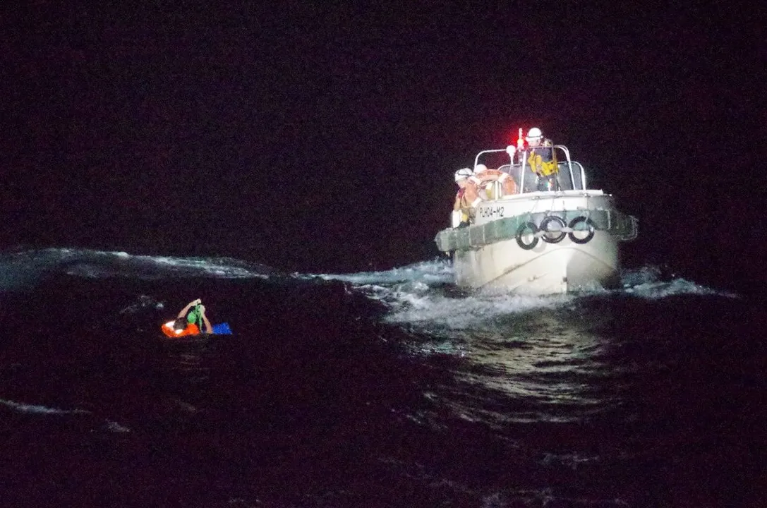  A Filipino crew member believed to be onboard Gulf Livestock 1, a cargo ship carrying livestock and dozens of crew members that went missing after issuing a distress signal due to Typhoon Maysak, is rescued by a Japan Coast Guard boat during their search and rescue operation at the East China Sea, to the west of Amami Oshima island in southwestern Japan, in this handout photo taken on September 2, 2020 and provided by Japan Coast Guard. Picture taken September 2, 2020. 10th Regional Coast Guard Headquarters - Japan Coast Guard/Handout via REUTERS. ATTENTION EDITORS - THIS PICTURE WAS PROVIDED BY A THIRD PARTY. MANDATORY CREDIT     TPX IMAGES OF THE DAY 