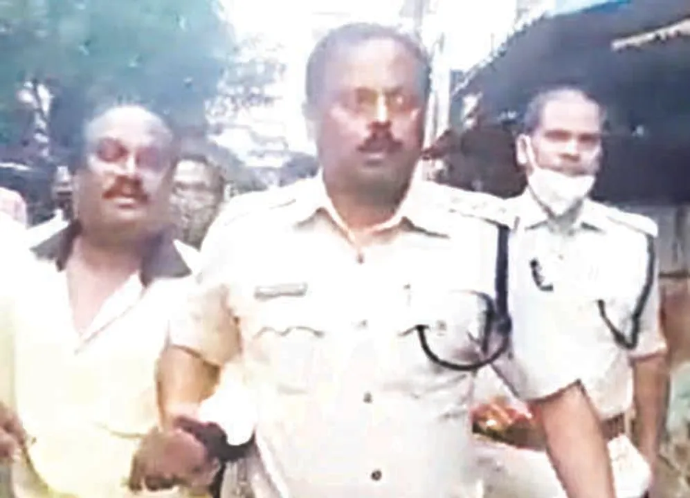  ମାନସ ଦାସଙ୍କ ଗିରଫ ବେଳର ଫଟୋ 