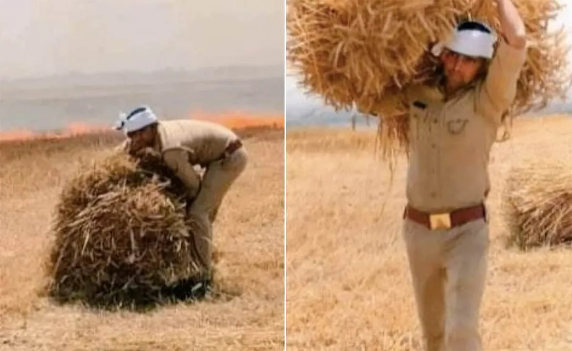  ନିଆଁ ଲାଗିଯିବାରୁ ଚାଷୀଙ୍କ ଫସଲକୁ କାନ୍ଧରେ ବୋହି ସୁରକ୍ଷିତ ସ୍ଥାନକୁ ନେଇ ଯାଉଛନ୍ତି ପୁଲିସ କର୍ମଚାରୀ