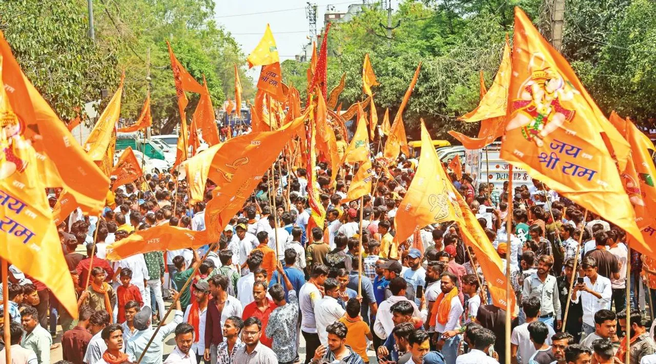  New Delhi: Devotees participate in a Ram Navmi procession at Jahangirpuri in New Delhi, Thursday, March 30, 2023. (PTI Photo)(PTI03_30_2023_000180A) 