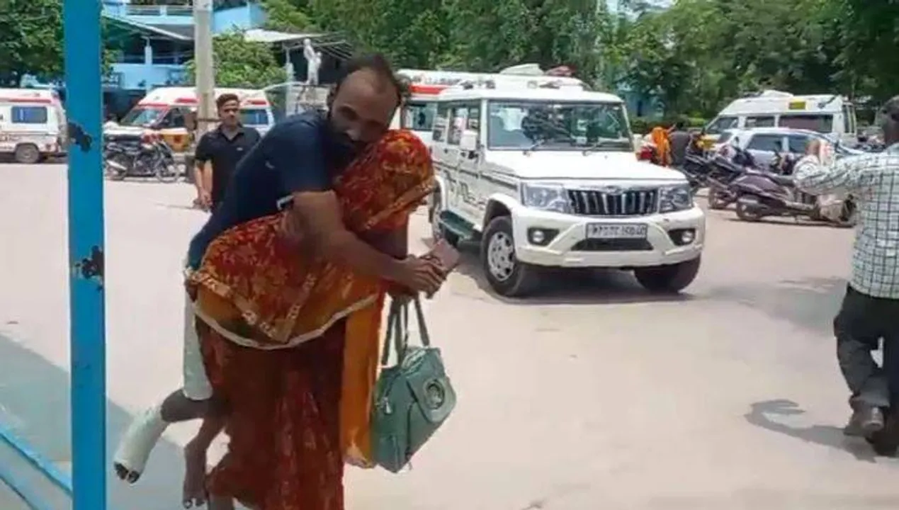  ଆହତ ସ୍ୱାମୀଙ୍କୁ ଡାକ୍ତରଖାନାକୁ ପିଠିରେ ବୋହି ନେଲେ ସ୍ତ୍ରୀ: ଭିଡିଓ ଭାଇରାଲ