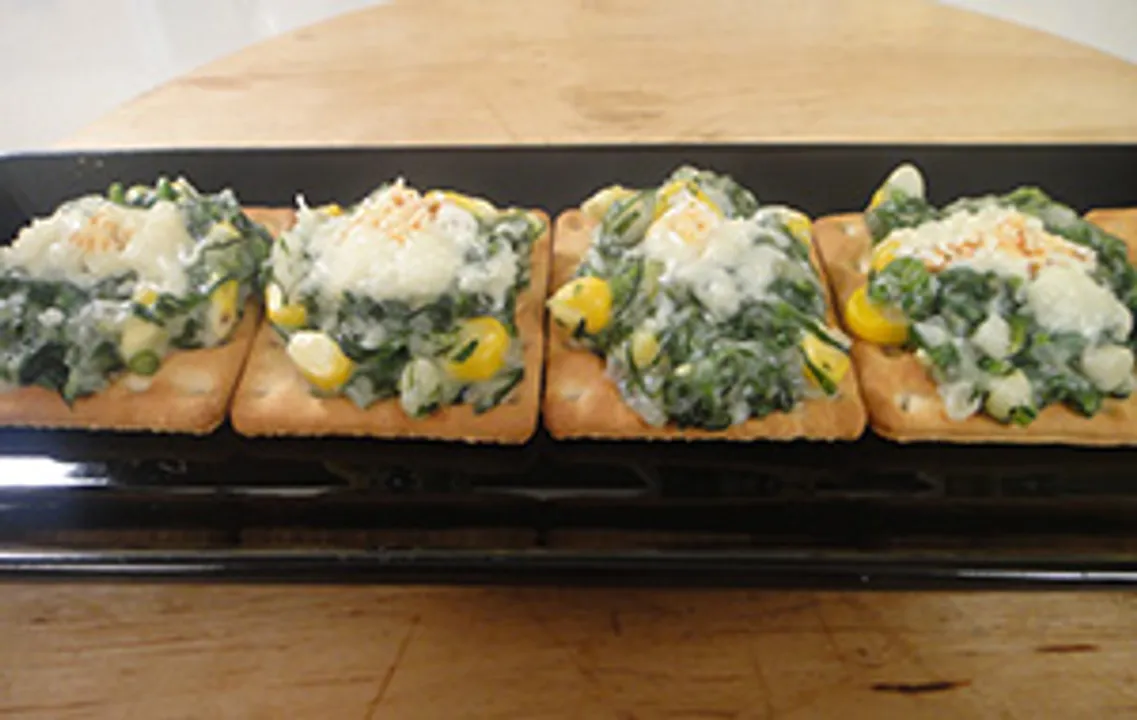 Spinach and Corn on Crackers
