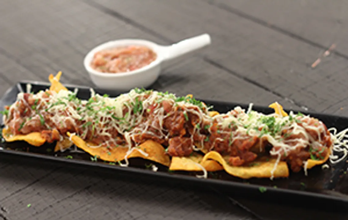 Nachos Refried beans and Salsa