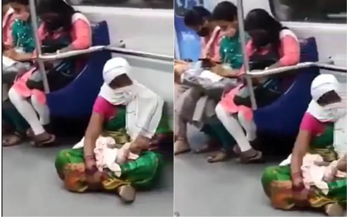 woman sitting on floor of metro