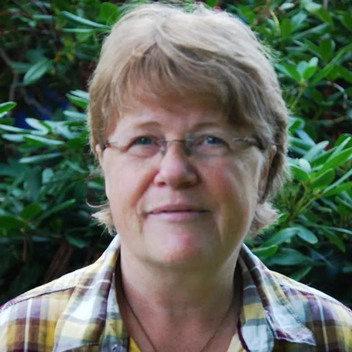 Survived by a wheelchair and an iridescent spirit, Bente Haulund Madsen works for the poor