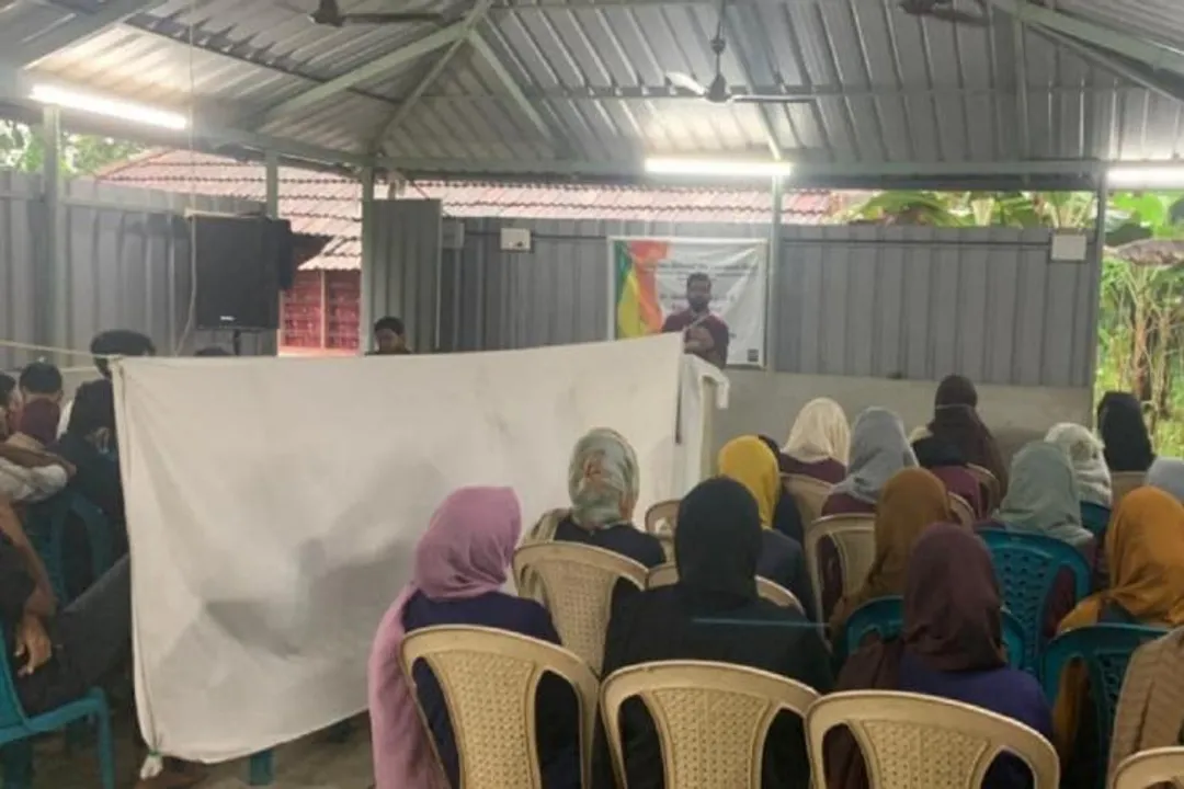 students separated by curtain