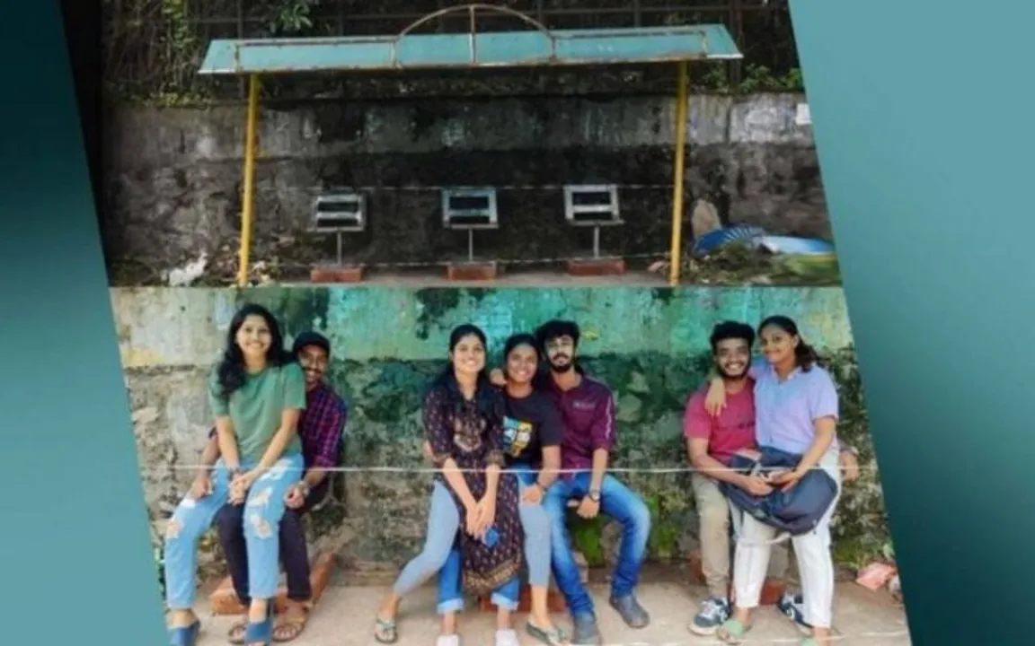 kerala students sit on lap