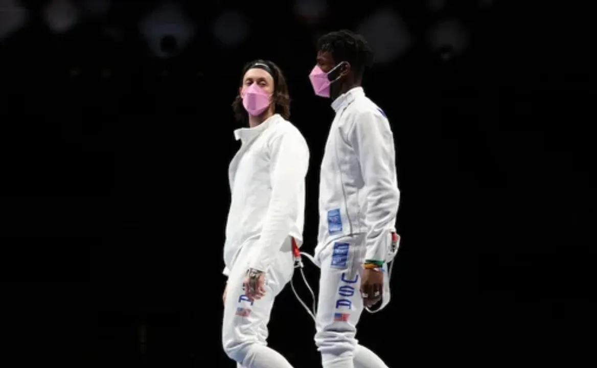 US fencers wear pink masks