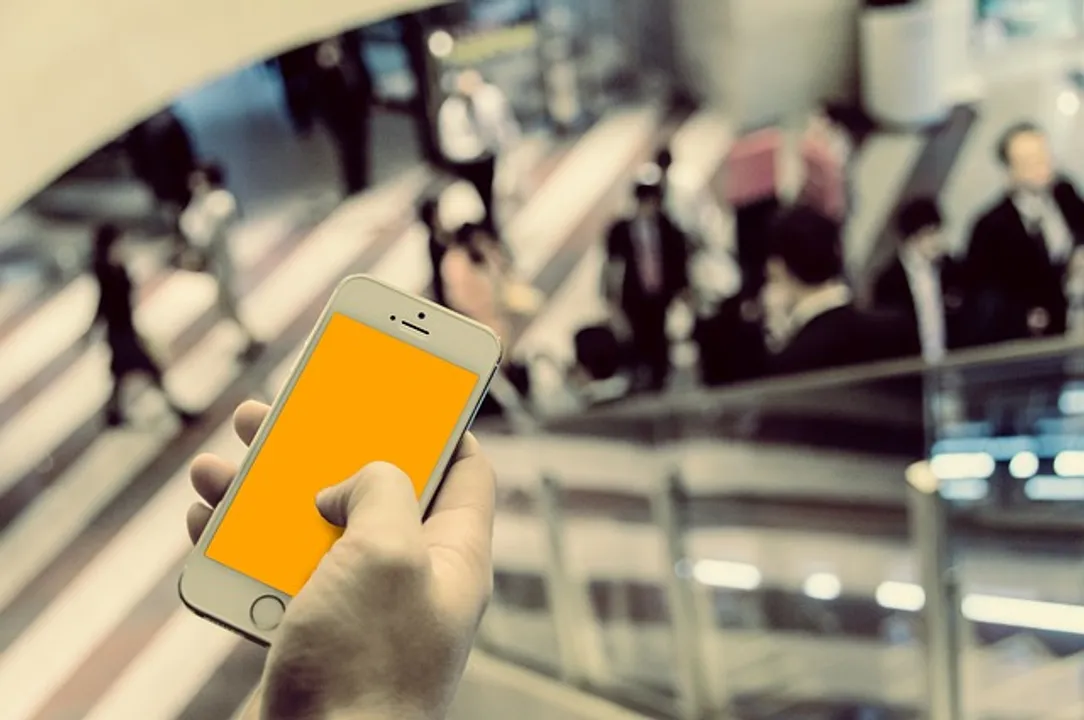 iphone mobile phone man crowd corporate business holding office