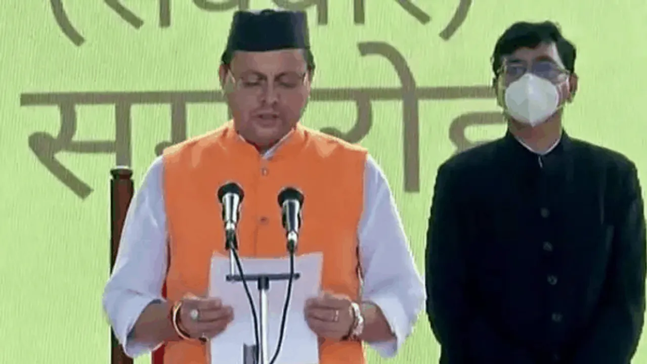 नाराजगी के बीच पुष्कर की ताजपोशी: उत्तराखंड में 11 मंत्रियों के साथ धामी ने ली  CM पद की शपथ

