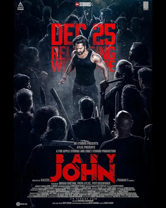  **ALT Text:**  
"बेबी जॉन मूवी पोस्टर: वरुण धवन एक्शन में, उनके साथ कीर्ति सुरेश और जैकी श्रॉफ प्रमुख किरदारों में।" 