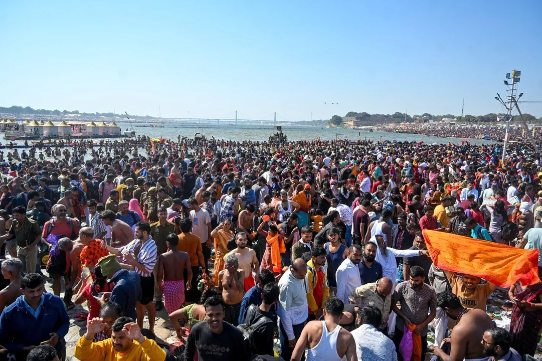  Prayagraj: Devotees gather to take a holy dip at the Triveni Sangam, the confluence of the Ganga, Yamuna, and the mythological Saraswati rivers, during the ongoing Maha Kumbh Mela 2025, in Prayagraj on Friday, February 14, 2025. (Photo: IANS) 