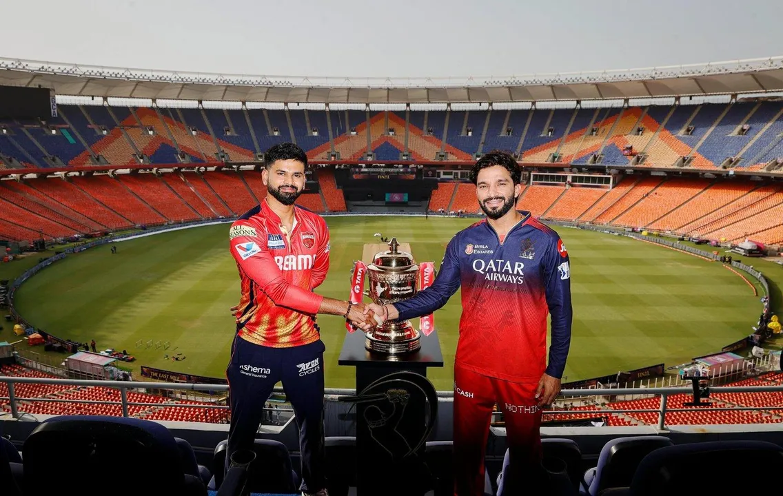  AHMEDABAD, JUN 2 (UNI):- Royal Challengers Bengaluru's captain Rajat Patidar and Punjab Kings' captain Shreyas Iyer with IPL trophy prior on the Indian Premier League 2025 final cricket match between Bengaluru and Punjab at Narendra Modi Stadium, in Ahmedabad on Monday. UNI PHOTO-121U 