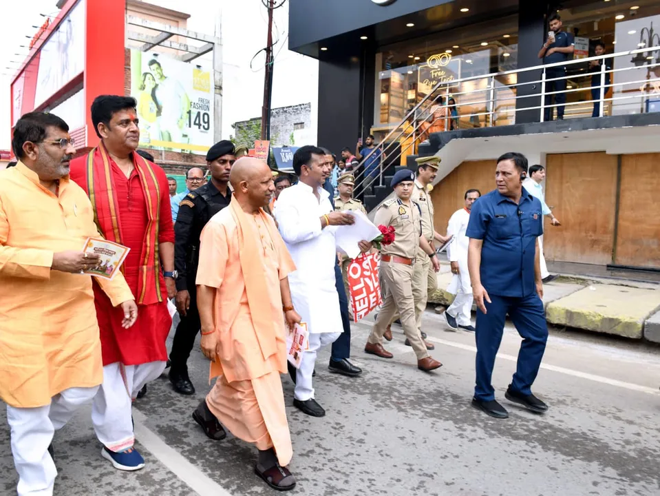  gst-reform-cm-yogi-padyatra-traders-customers 