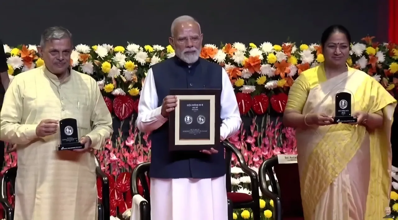  pm-modi-releases-rss-centenary-coin-stamp 