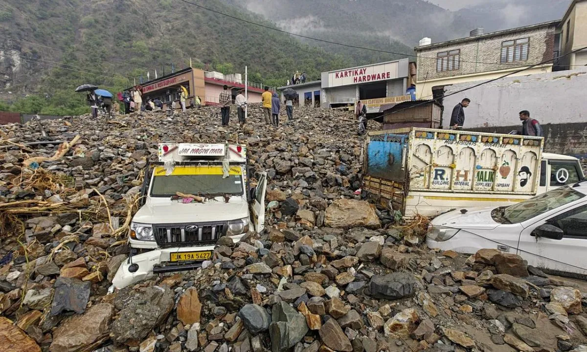  Videos from the scene show trucks stuck on roads and some vehicles buried under piles of mud and rocks.
Photograph: (The  Hindu) 