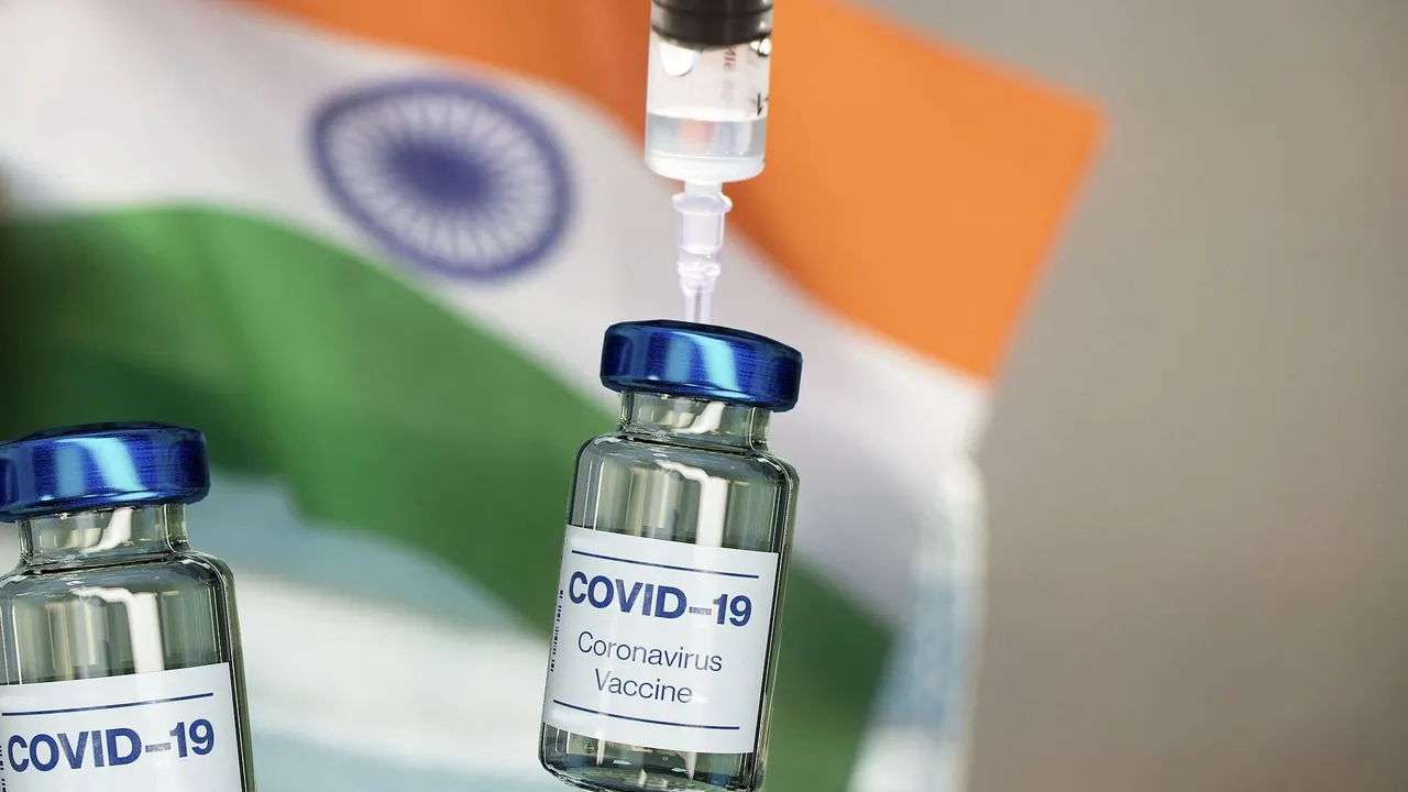  India's vaccinations hit record as government provides free COVID jab for all adults