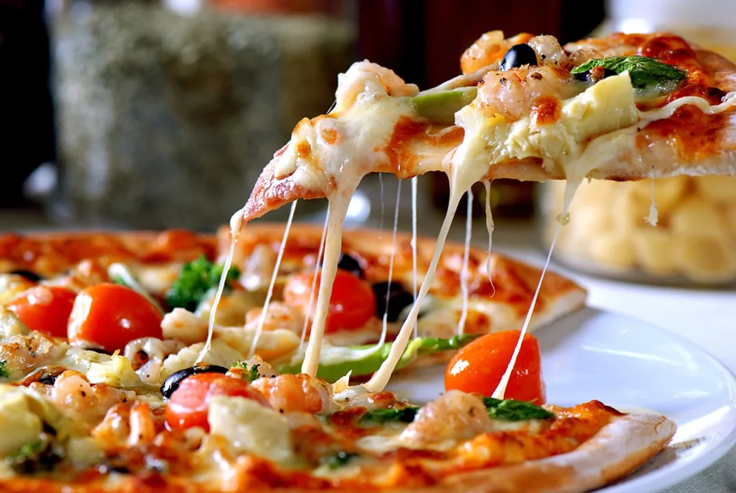  Pizza toppings to be costlier than pizza? Toppings will now attract 18% GST, as they contain different ingredients