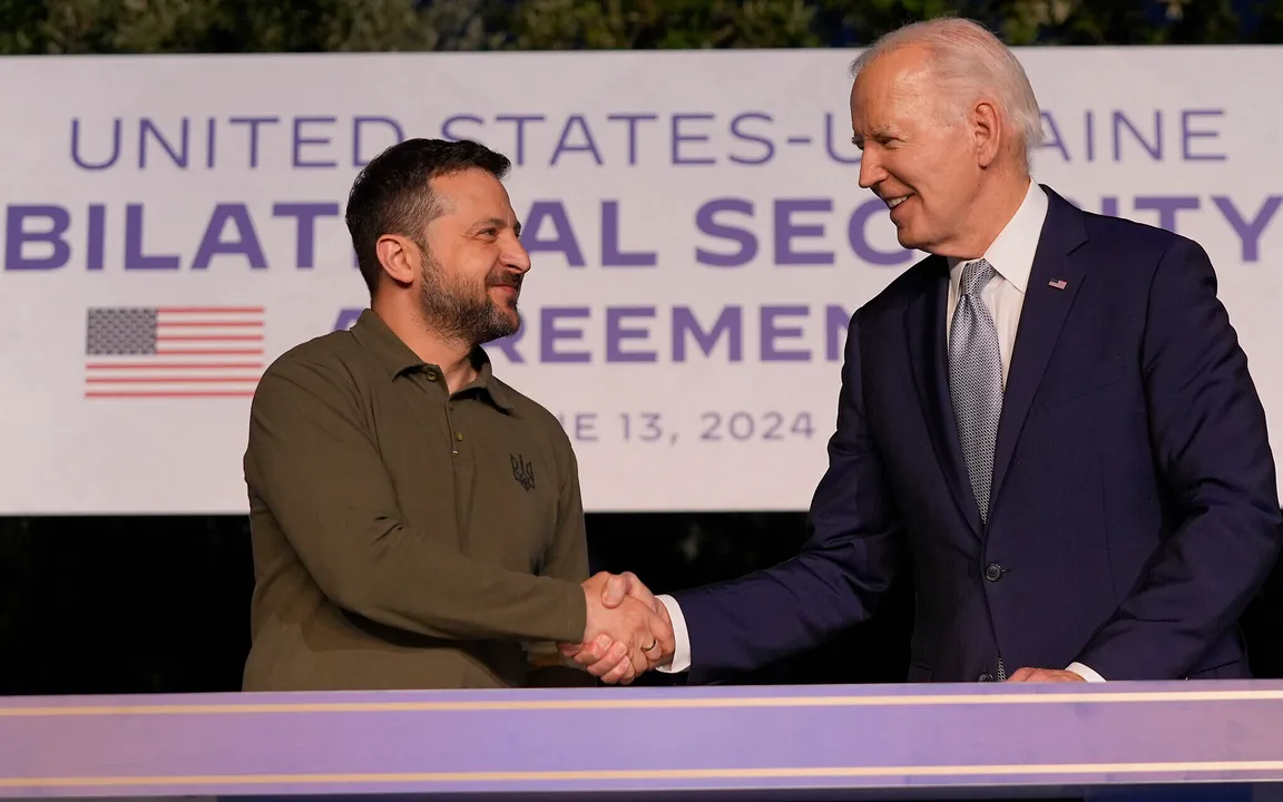  Biden and Zelenskyy sign defence agreement as Ukraine approaches NATO membership