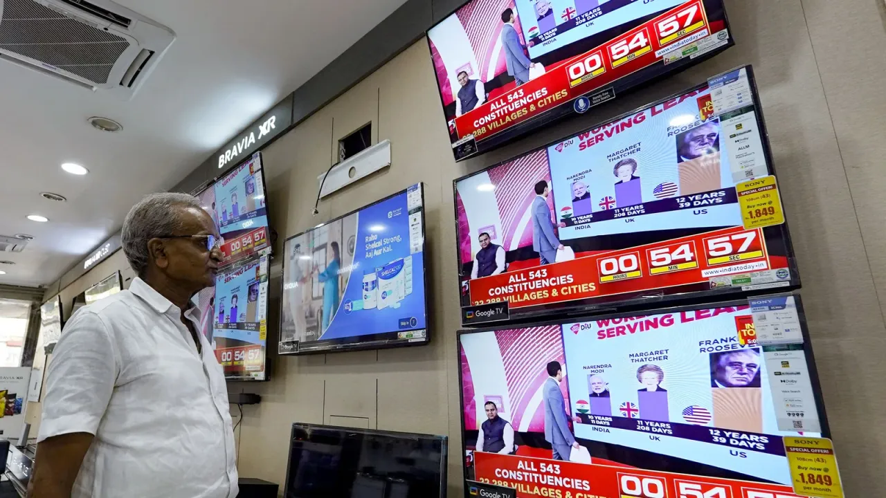  Live vote counting on big screens at key locations of Delhi
