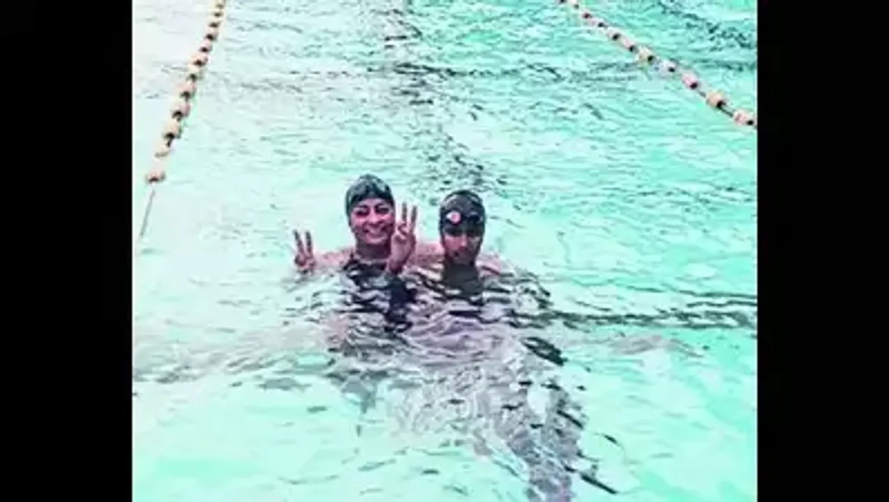  Mother-son from Karnataka set astounding 12-hour non-stop swimming record