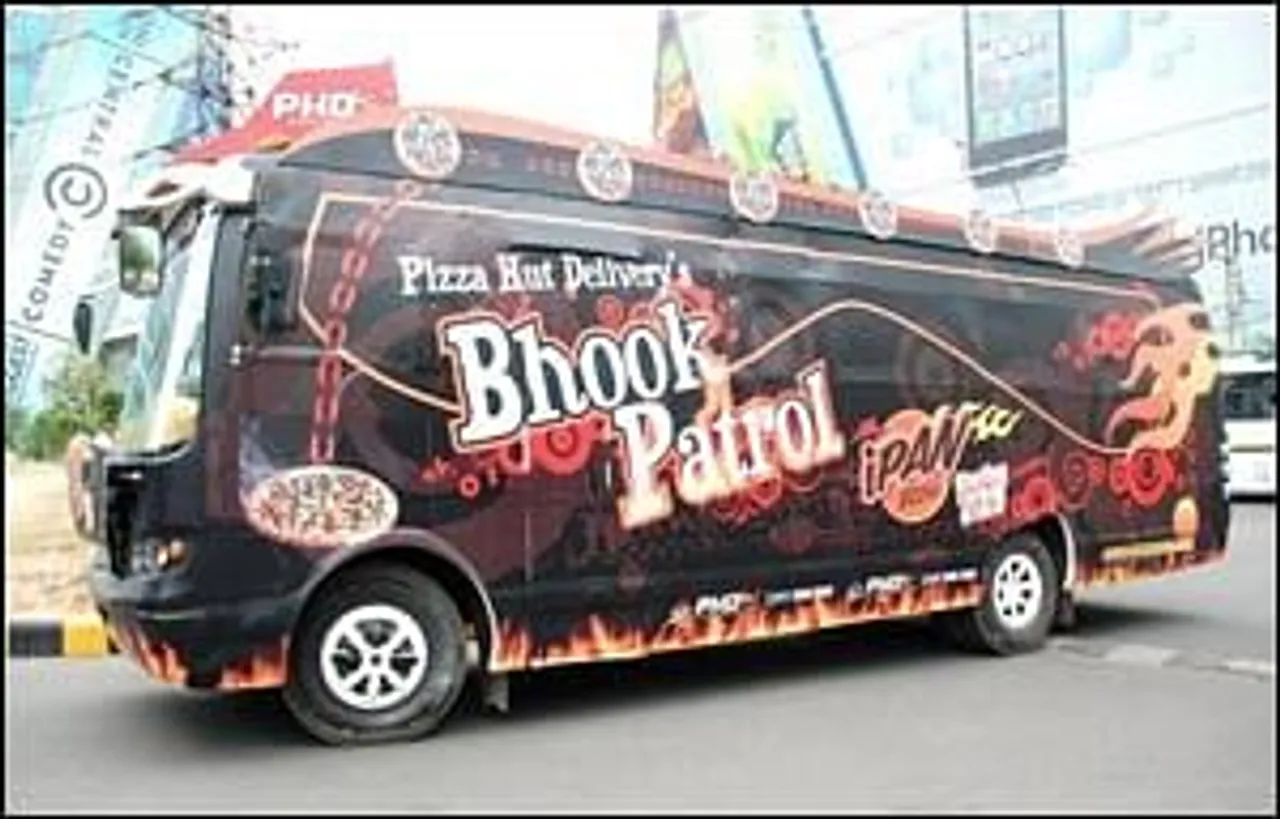 iPan Pizzas rides on Bhook Patrol bus