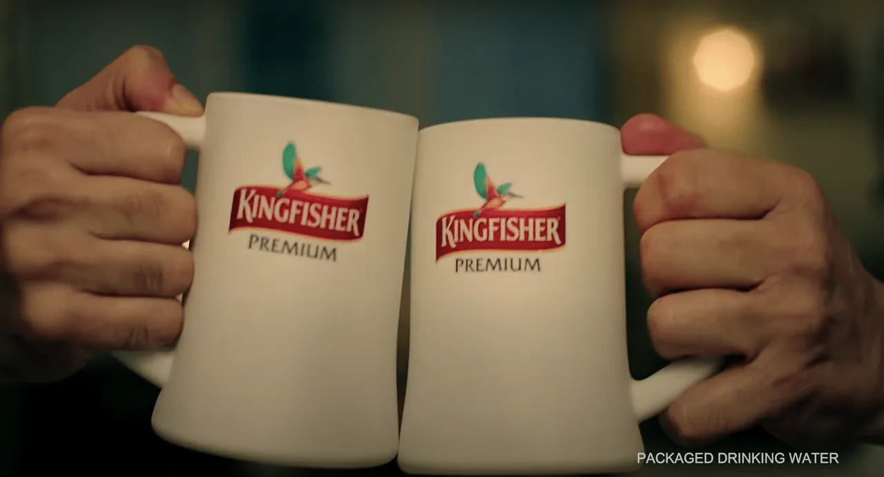 Kingfisher's new ad shows father-son cracking a cold one open...