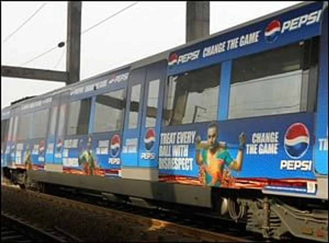 Mudra Max wraps Delhi Metro trains with Pepsi packaging