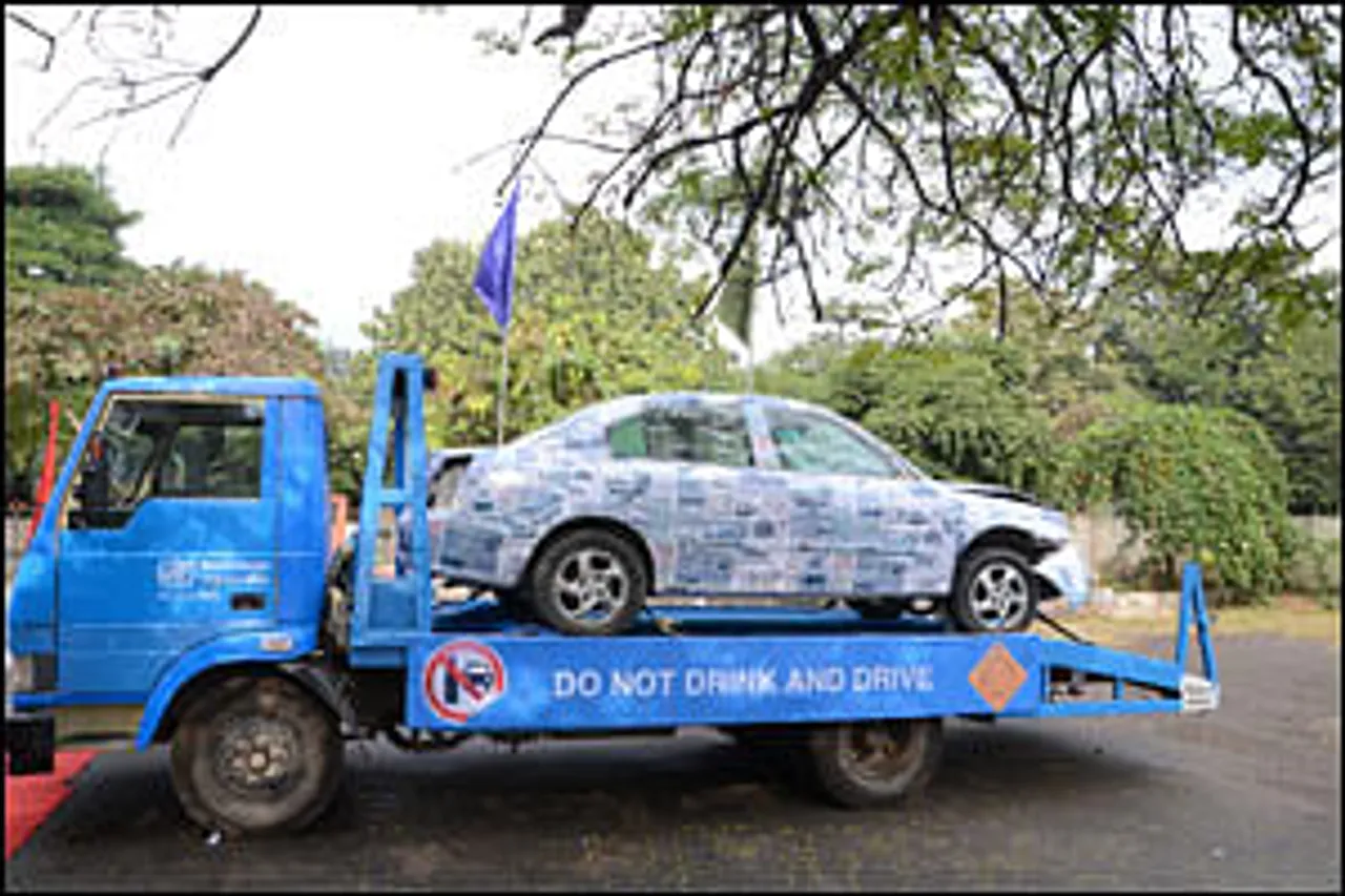 Crumpled car carries road safety message