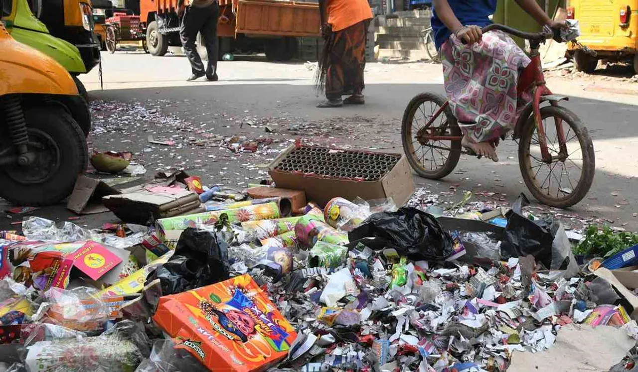 DEEPAVALI_CRACKERS_GARBAGE_CONSERVANY_WORKER_CLEANING.jpg