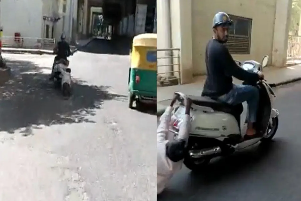 স্কুটারের পিছনে টেনে নিয়ে যাওয়া হচ্ছে এক ব্যক্তিকে, ভাইরাল ভিডিও