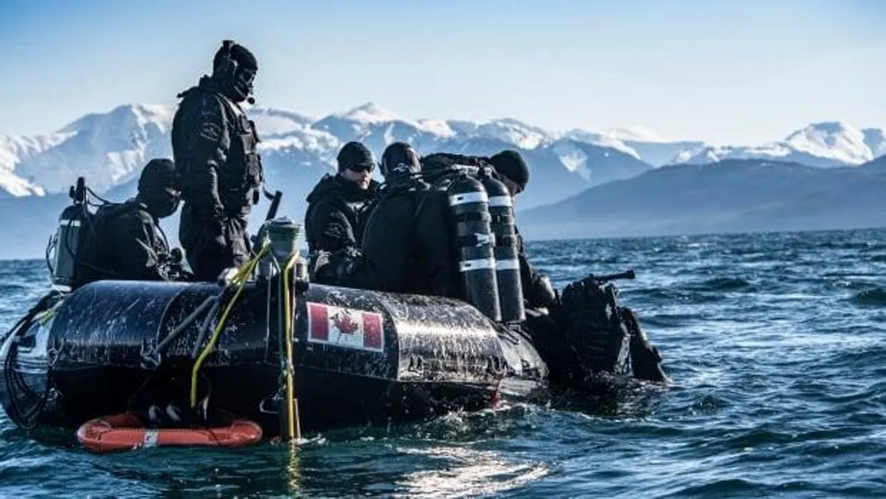 CANADA LOOKS TO REINFORCE ARTIC SOVEREIGNTY Through DIPLOMACY, MILITARY Says MINISTER