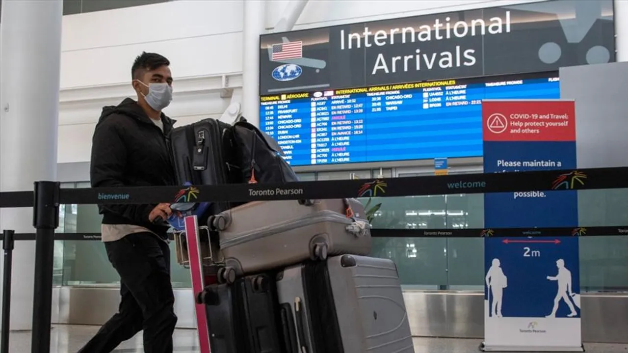 OTTAWA TO TOUGHEN INTERNATIONAL TRAVEL RESTRICTIONS AS OMICRON CONCERN ESCALATES